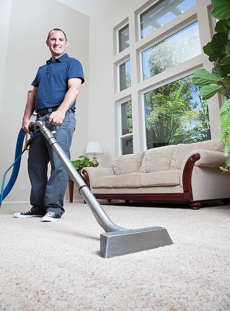 Man cleaning carpet in home - Gleamers Cleaning Gleamers Cleaning ervices